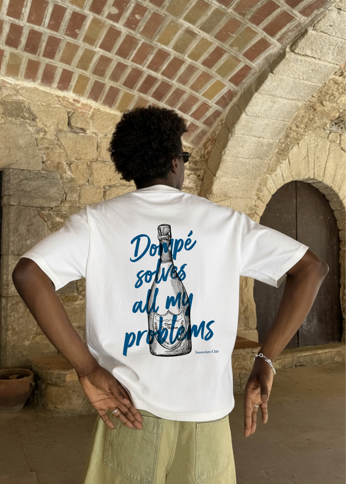 DOMPÉ SOLVES PROBLEMS TEE
